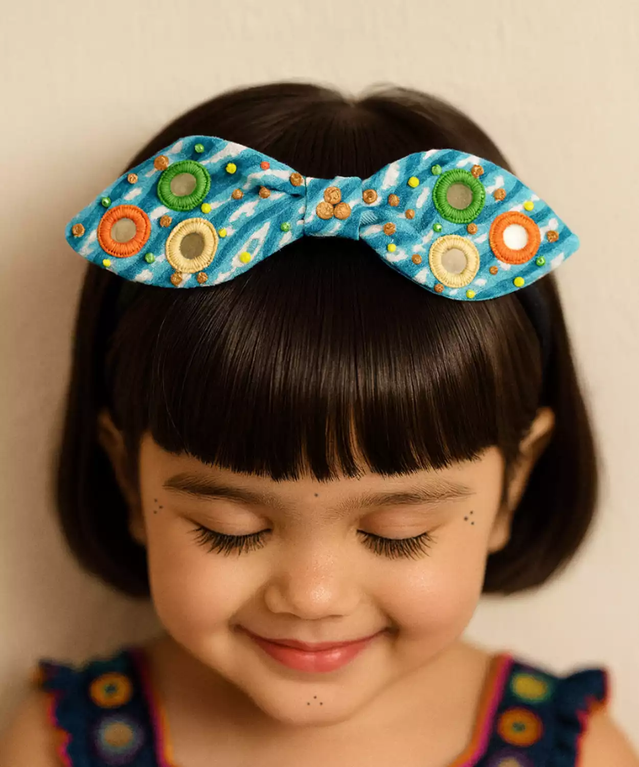 Ethnic Bow Hairband with Circular Embellishments- Blue, Orange, Green