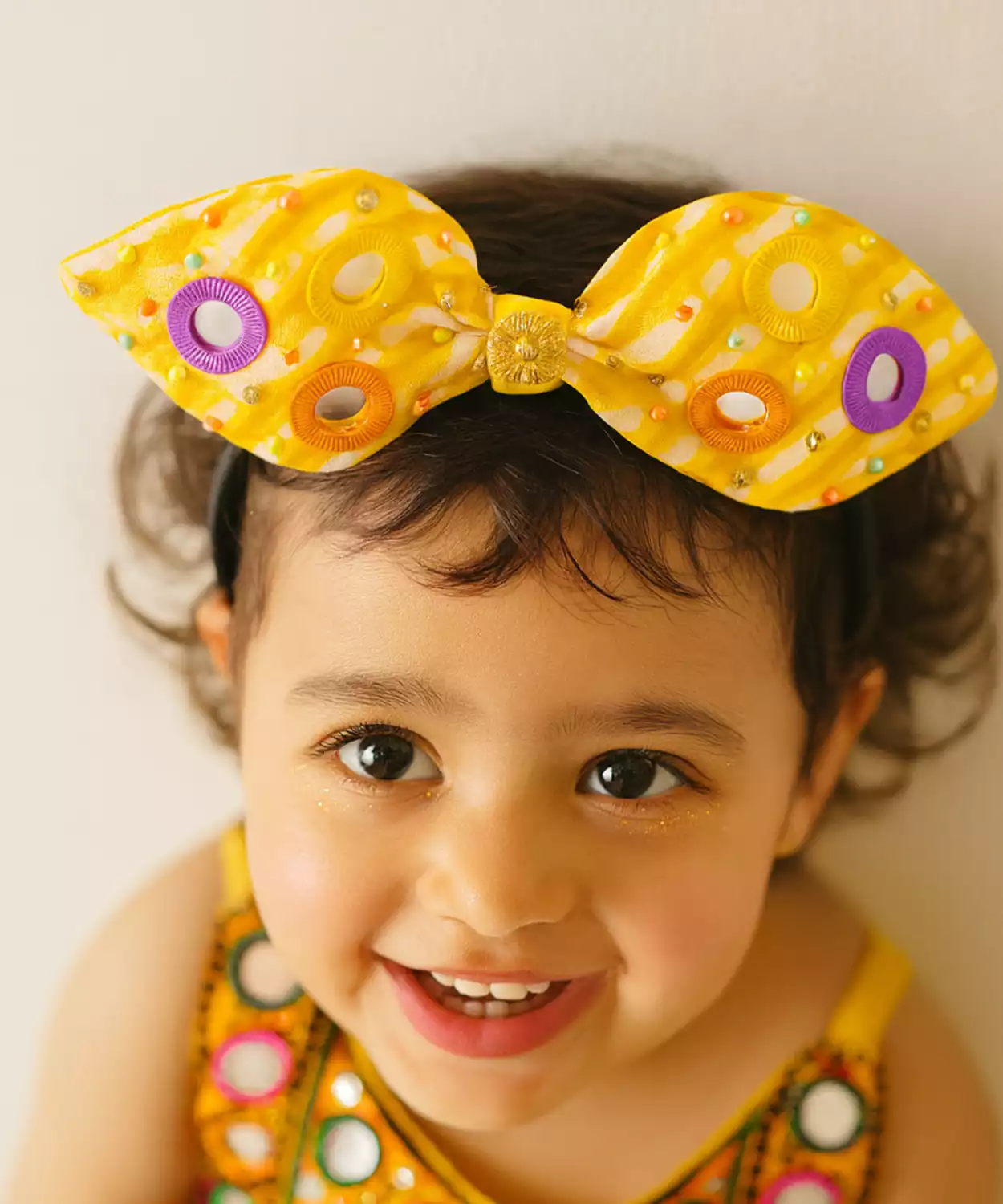 Festive Bow Hairband with Circular Embellishments -Yellow, Purple, Orange