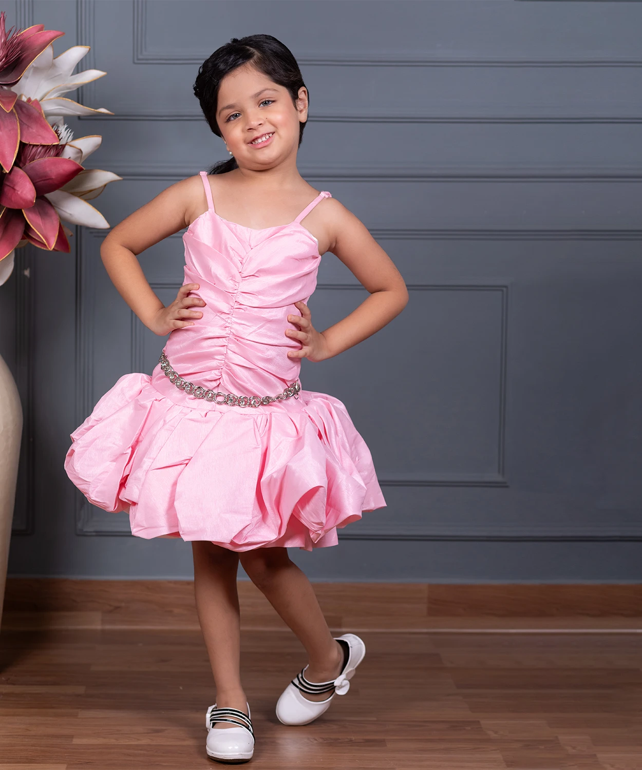 A Shimmery Pink Dress With A Unique Silhouette