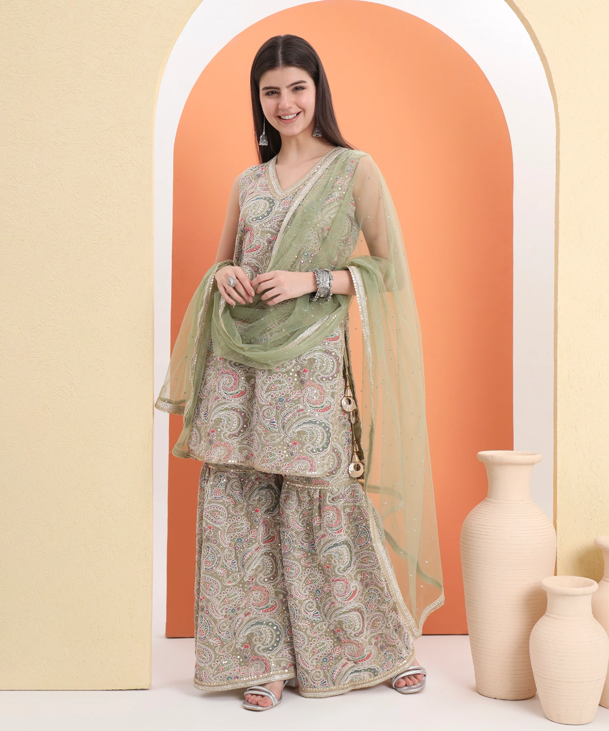Embroidered Georgette Kurta And Sharara Paired With Soft Net Dupatta