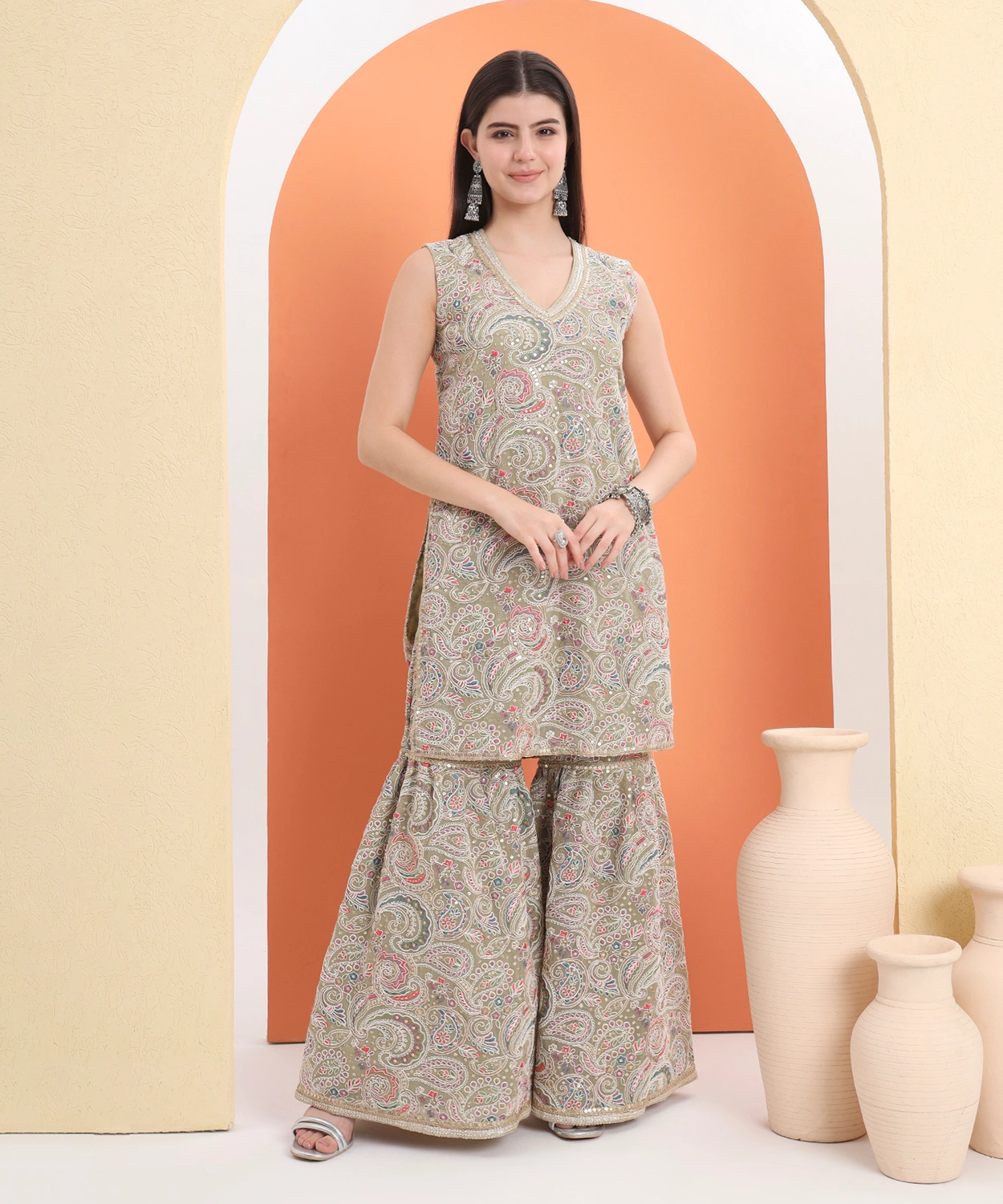Embroidered Georgette Kurta And Sharara Paired With Soft Net Dupatta