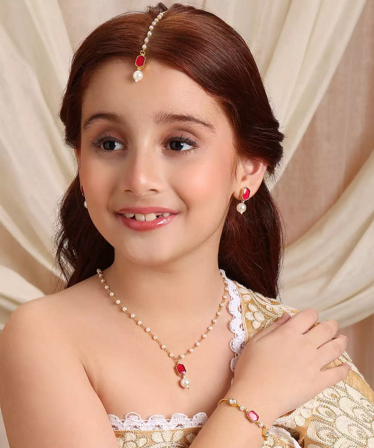 Kundan Maroon Stone Jewelry Set in Gold Plated Brass with Pearls